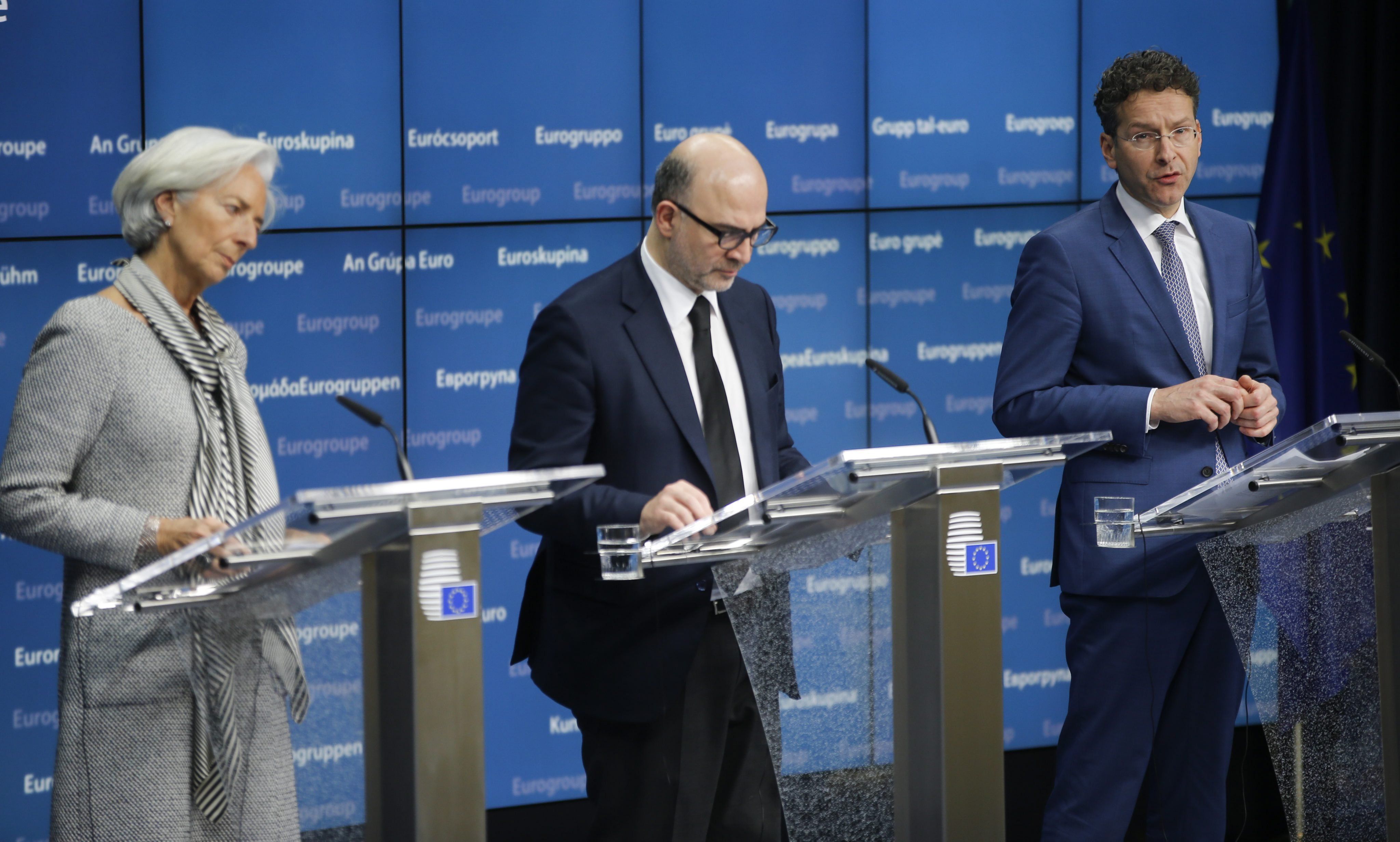 IWF-Chefin Christine Lagarde, EU-Währungskommissar Pierre Moscovici und Eurogruppen-Chef Jeroen Dijsselbloem bei einer Pressekonferenz nach der Sondersitzung in Brüssel. Foto: EPA