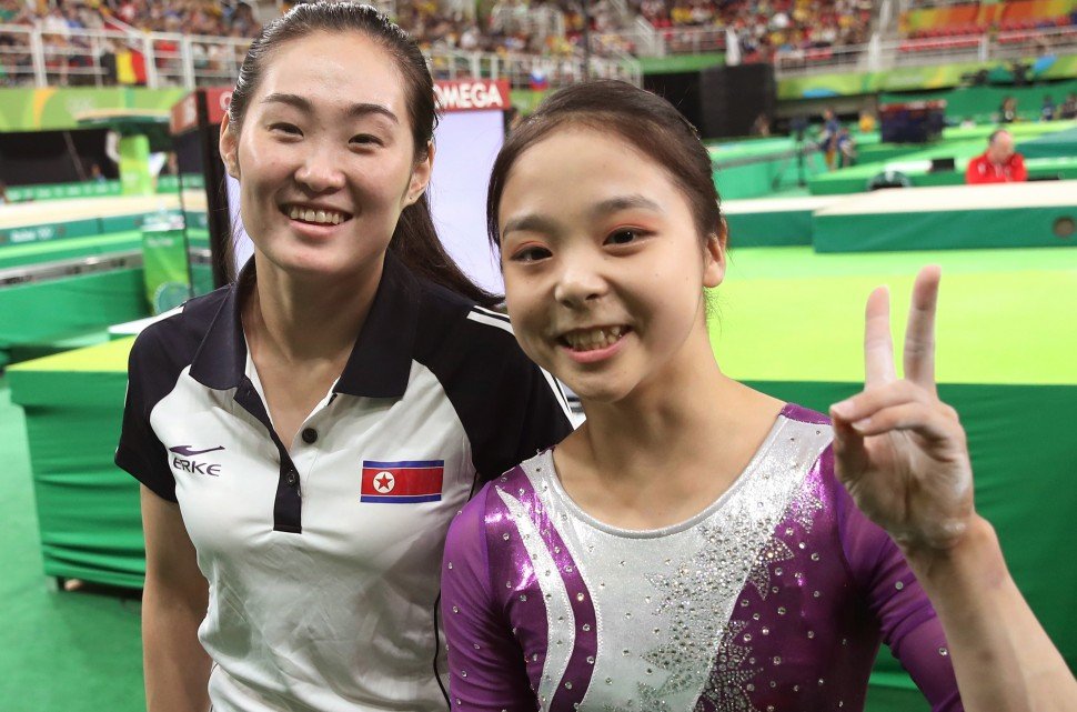 In this Sunday, Aug 7, 2016 photo, South Korean gymnast Lee Eun-ju, right, and her North Korean counterpart Hong Un Jong pose together for photographers during the artistic gymnastics women's qualification at the 2016 Summer Olympics in Rio de Janeiro, Brazil. Like dozens of athletes at the Rio Games, some competitors from North and South Korea have posed together for grinning selfies, which have then been posted to social media and documented by some of the hundreds of journalists here. These interactions are not strictly illegal in South Korea, but they are complicated by the Koreas’ long history of animosity and bloodshed. (Kim Do-hoon/Yonhap via AP) KOREA OUT In this Sunday, Aug 7, 2016 photo, South Korean gymnast Lee Eun-ju, right, and her North Korean counterpart Hong Un Jong pose together for photographers during the artistic gymnastics women's qualification at the 2016 Summer Olympics in Rio de Janeiro, Brazil. Like dozens of athletes at the Rio Games, some competitors from North and South Korea have posed together for grinning selfies, which have then been posted to social media and documented by some of the hundreds of journalists here. These interactions are not strictly illegal in South Korea, but they are complicated by the Koreas’ long history of animosity and bloodshed. (Kim Do-hoon/Yonhap via AP) KOREA OUT