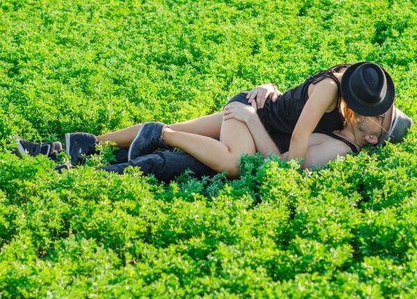 man and woman in a meadow man and woman in a meadow