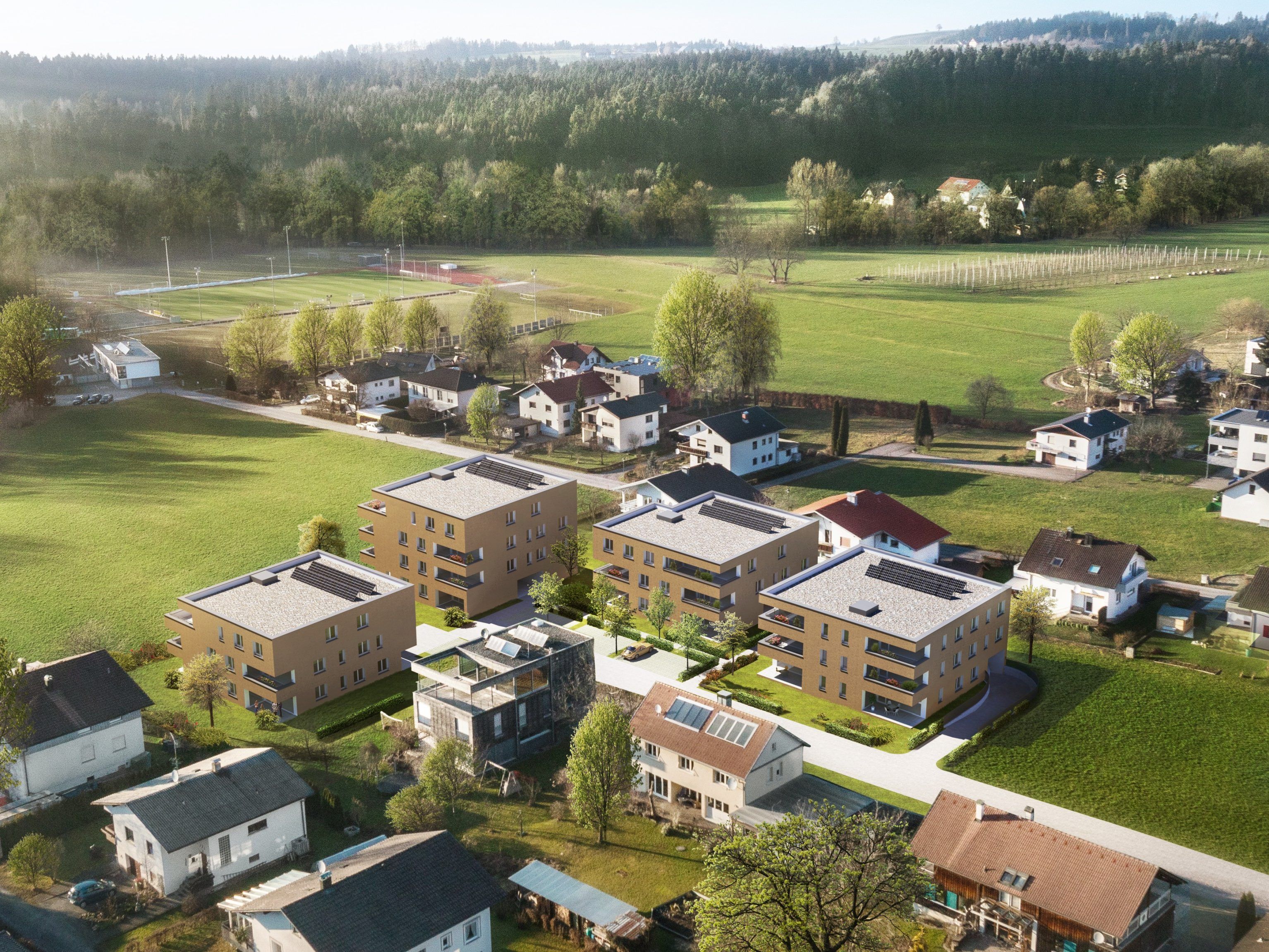 Zentrumsnah und dennoch im Grünen: Die vier Häuser der Wohnanlage am Patachoweg in Hörbranz fügen sich stimmig ins Ortsbild ein. Zentrumsnah und dennoch im Grünen: Die vier Häuser der Wohnanlage am Patachoweg in Hörbranz fügen sich stimmig ins Ortsbild ein.