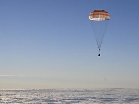 Die Crew kurz vor der Landung auf der Erde