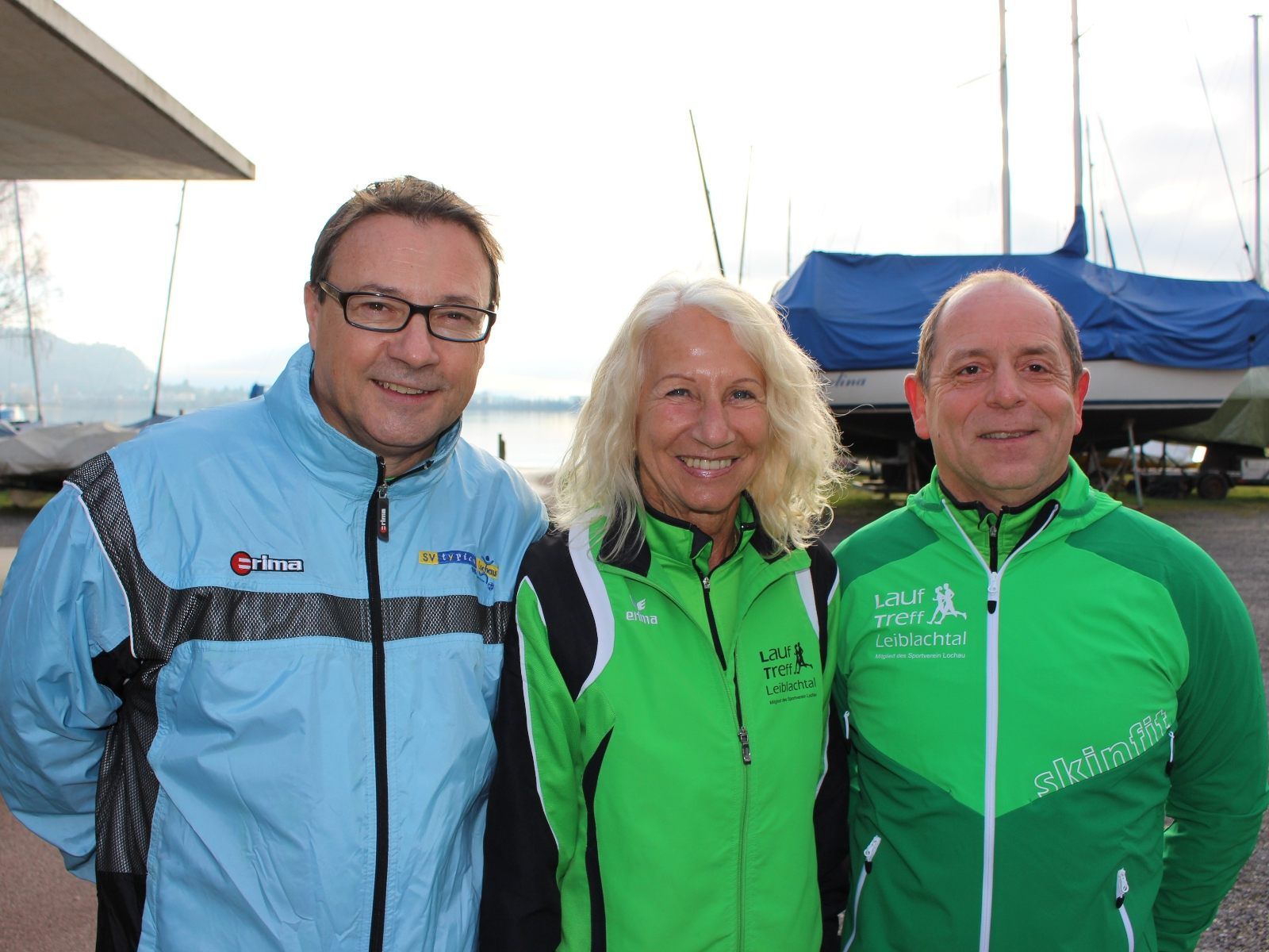 Sportreferent Christophorus Schmid von der Gemeinde sowie Brigitte Haest und Peter Hehle vom „LaufTreff Leiblachtal“ laden zum „Lochauer Dreikönigslauf am See“.