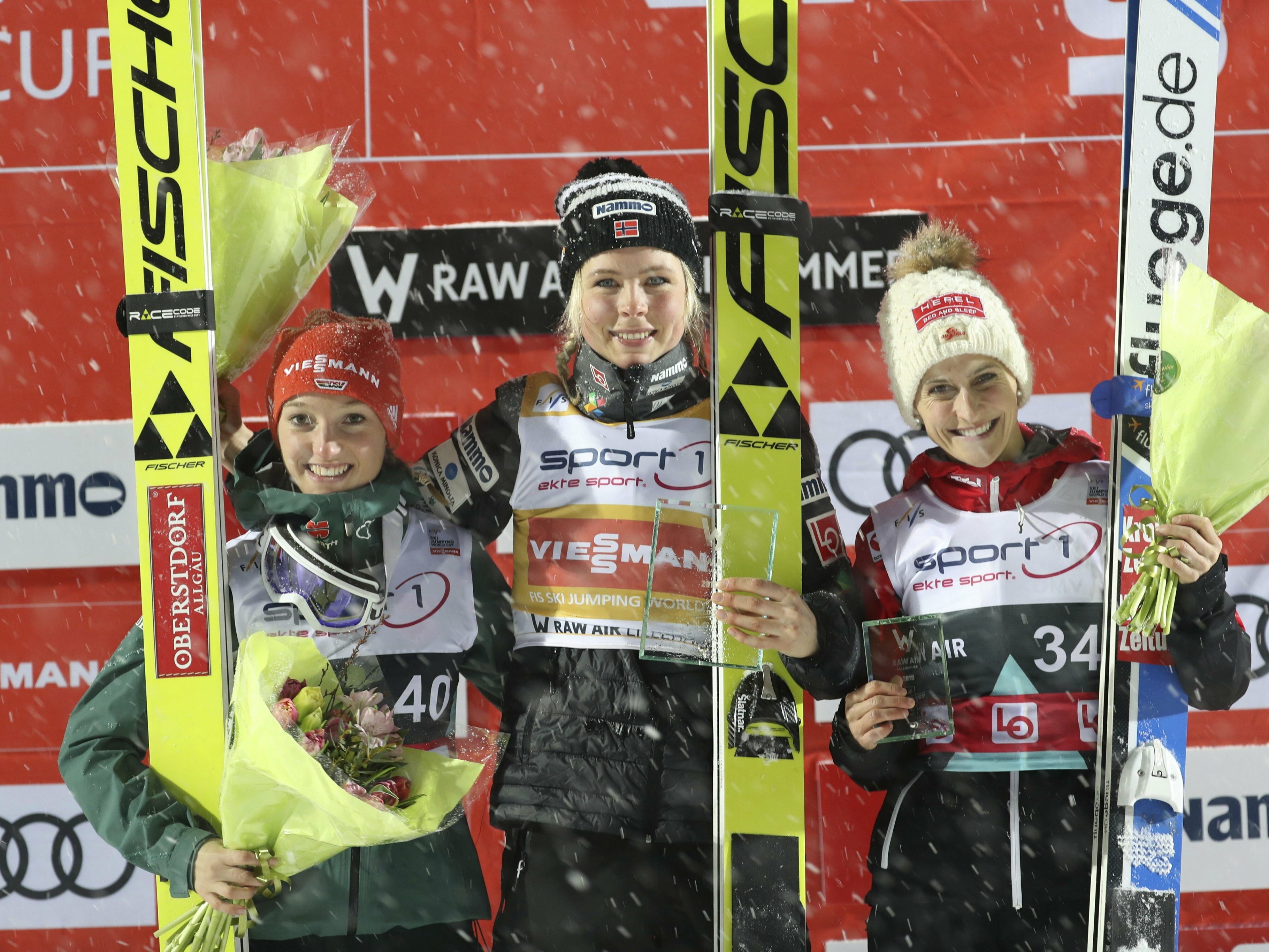 From left, second place Katharina Althaus (GER), first placed Maren Lundby (NOR) and third placed Eva Pinkelnig (AUT From left, second place Katharina Althaus (GER), first placed Maren Lundby (NOR) and third placed Eva Pinkelnig (AUT