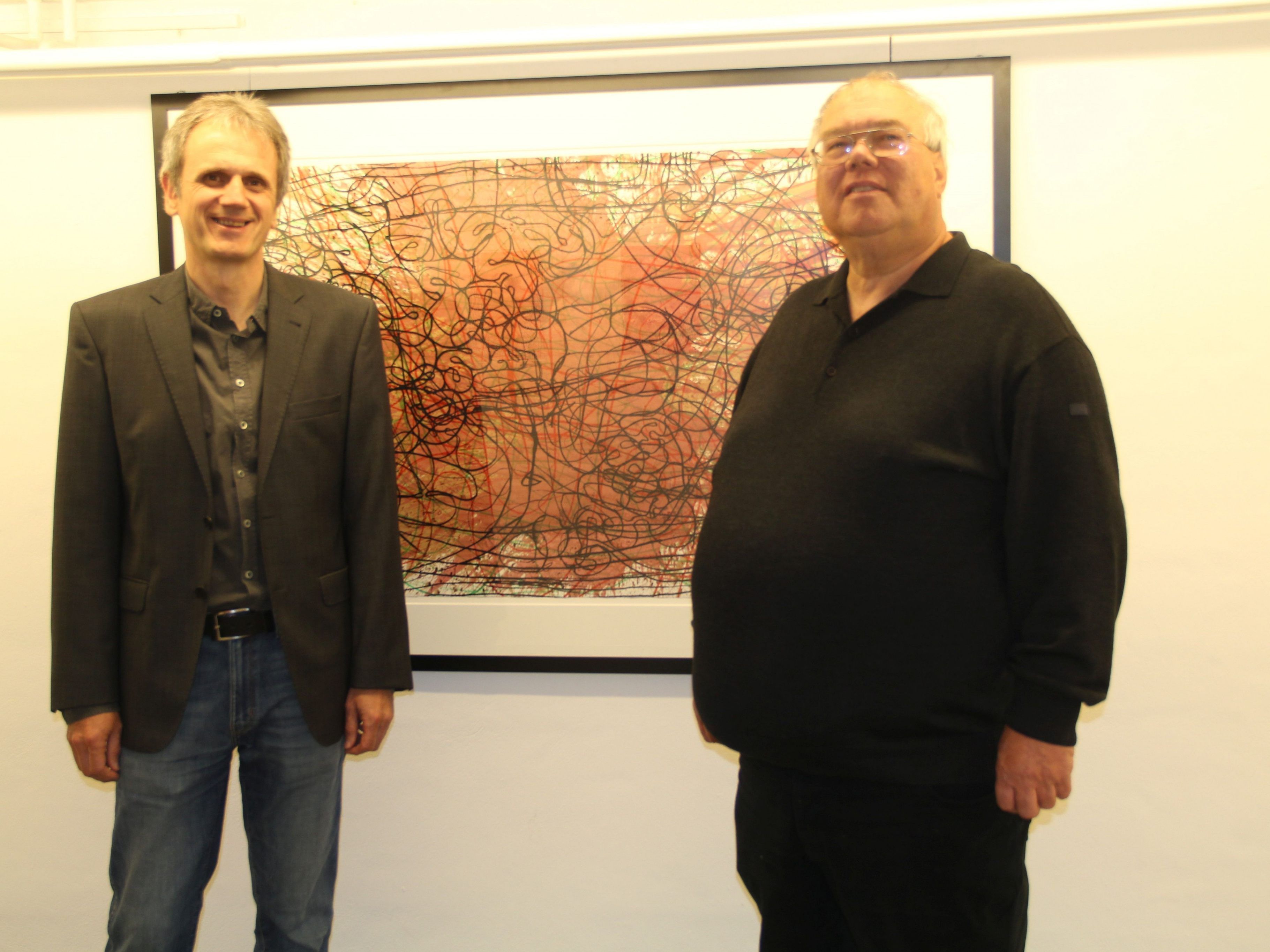 Karl Peter und Markus Gell mit einem großformatigen Ausstellungsstück