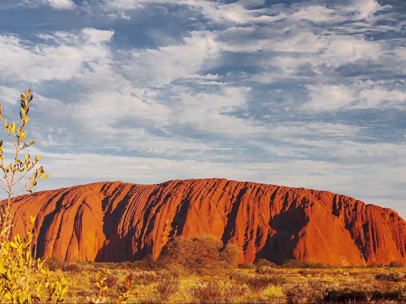 Für die Aborigines ist der Uluru, der natürlich entstandene Sandgesteinblock, heilig.