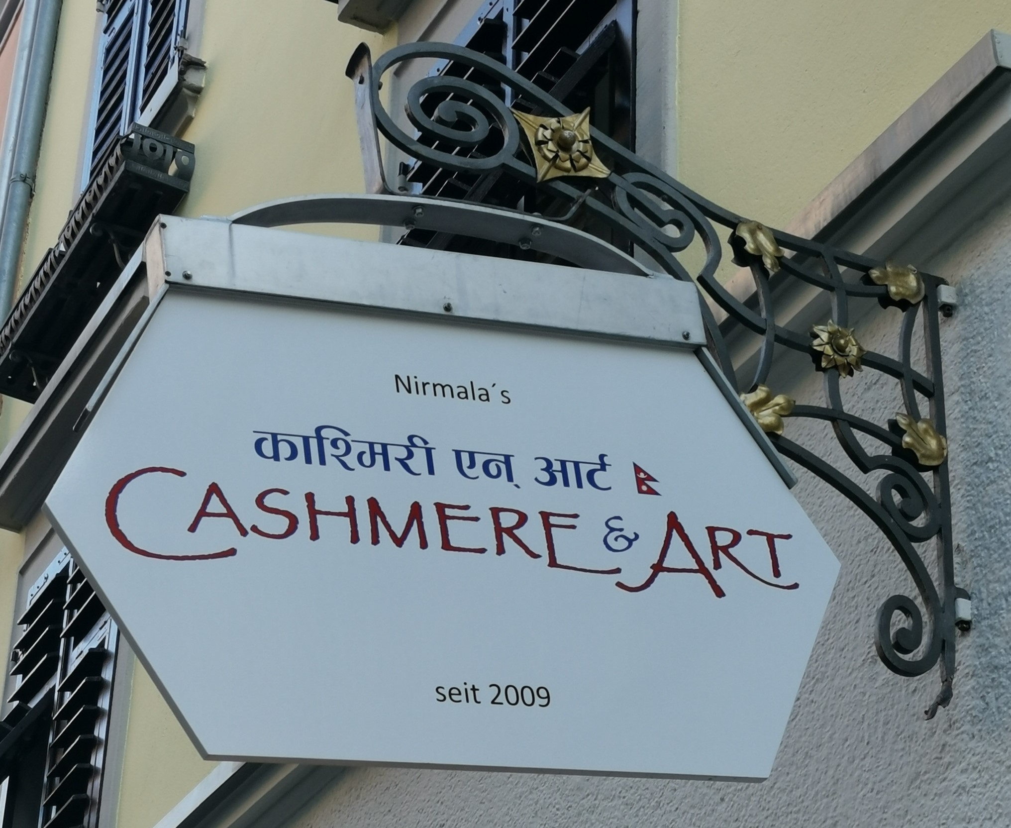 Historisches Firmenschild aus Schmiede-Eisen