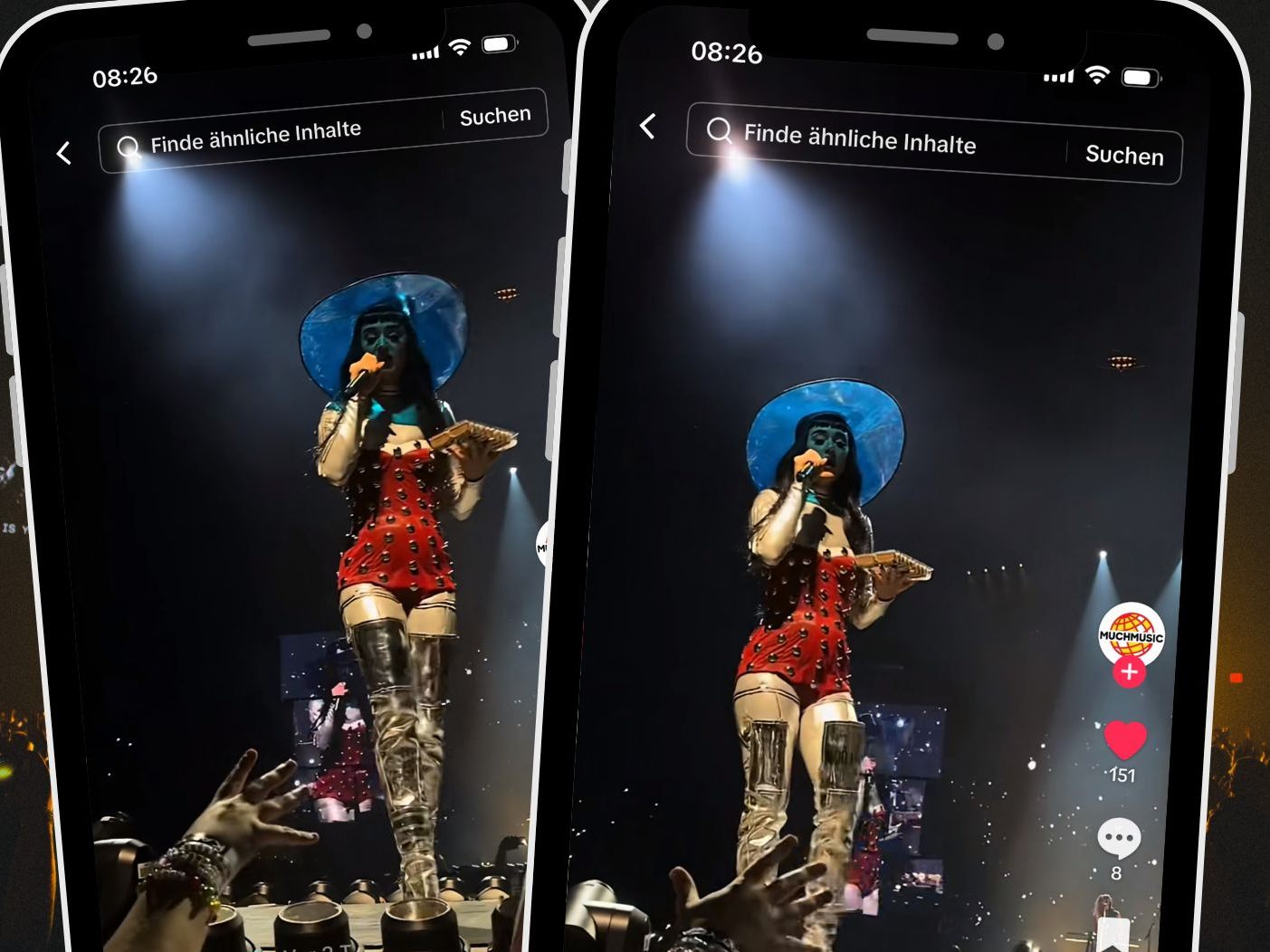 Katy Perry wehrt Fan-Geschenk während ihres Auftritts mit dem Mikrofon ab.